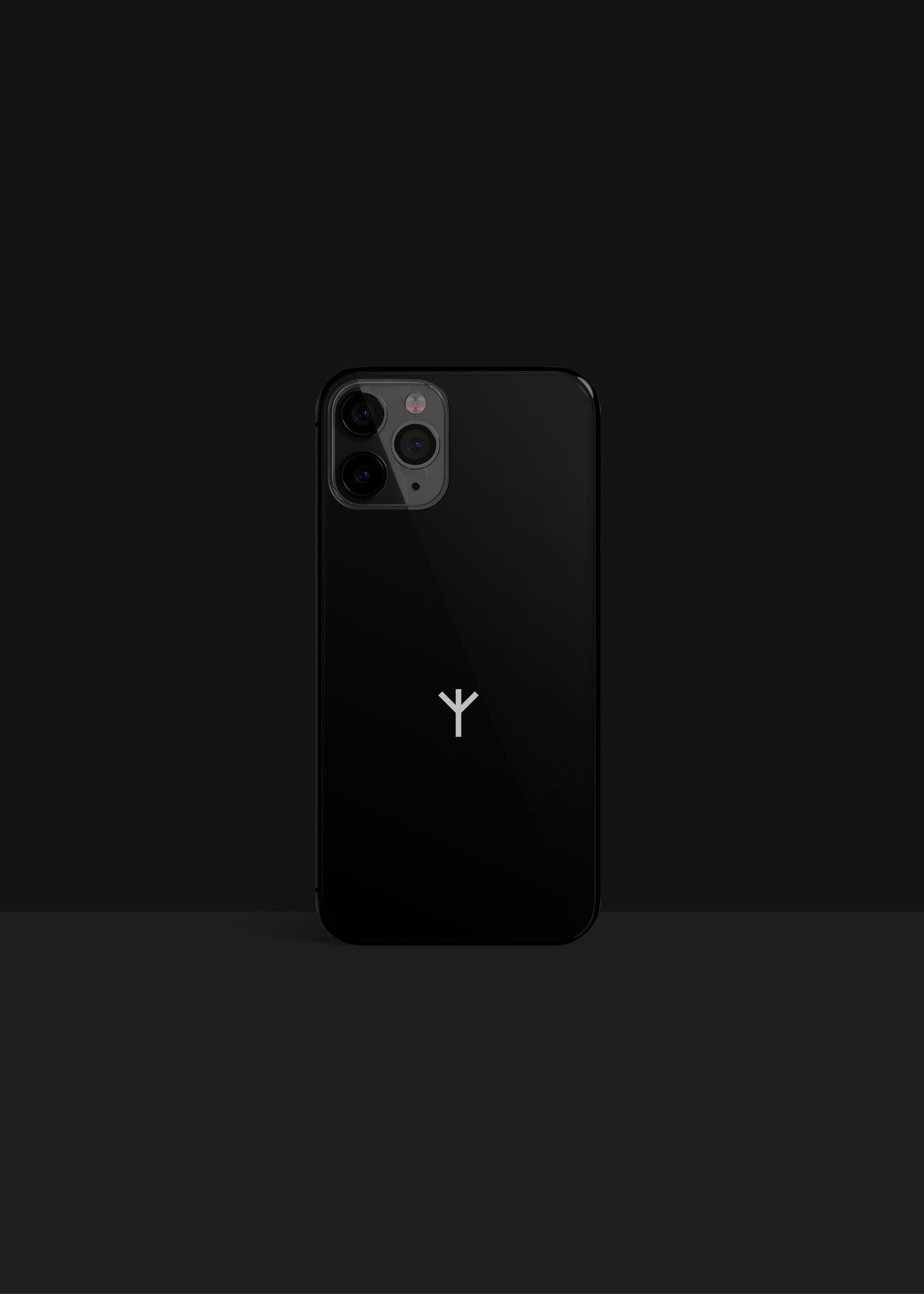 Algiz Rune iPhone Case in glossy black finish reflects a combination of Viking culture and minimalist Scandinavian design.
